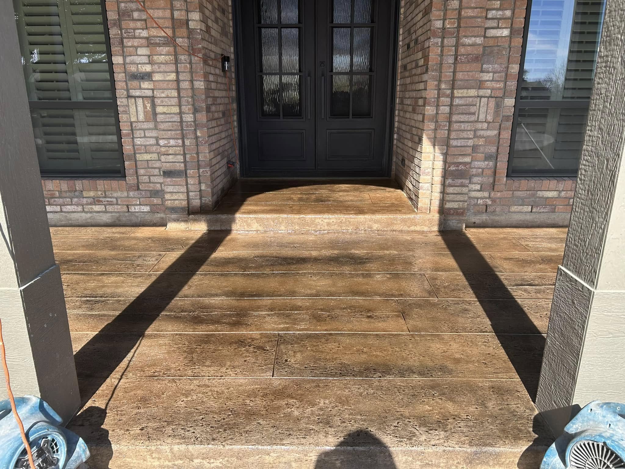 Stained front porch concrete